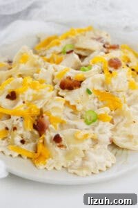 A white plate filled with the crack chicken pasta.