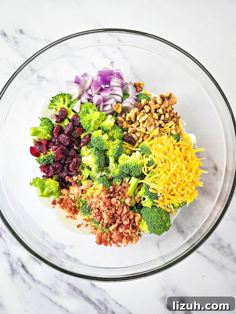 Keto Broccoli Salad with Bacon, Cheddar & Creamy Dressing 6 broccoli salad ingredients in a bowl