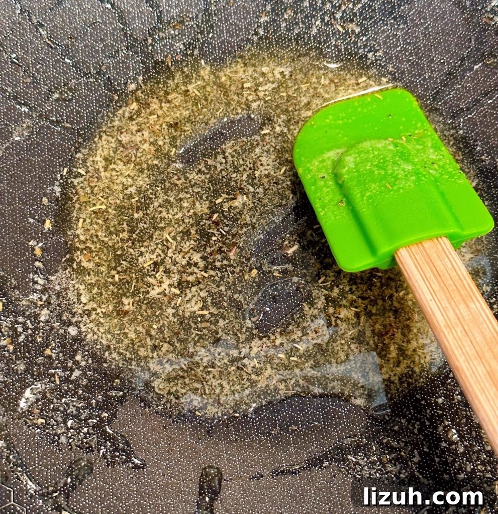 Skillet Croutons from Scratch: Crispy Homemade Recipe 4 Large skillet with melted butter, olive oil, seasonings.
