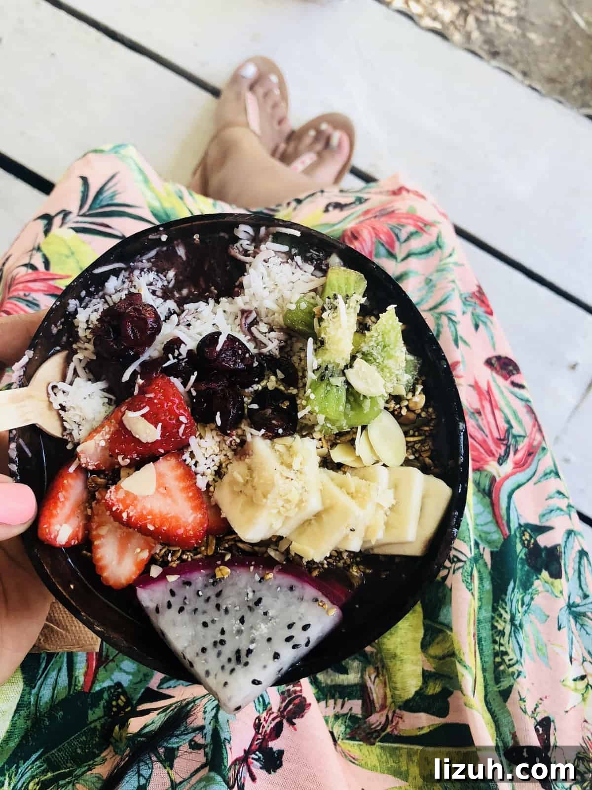 Tulum Travel Guide: Top Food, Where to Stay & Things to Do 4 Top down shot of a a breakfast, with chopped strawberries, kiwis and dragon fruit.