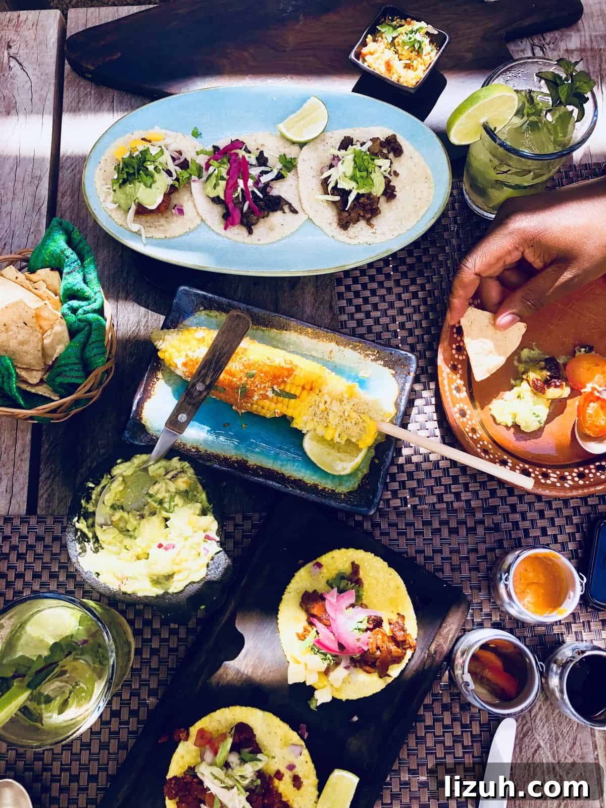 Tulum Travel Guide: Top Food, Where to Stay & Things to Do 8 Top down view of various delicious plates of food.