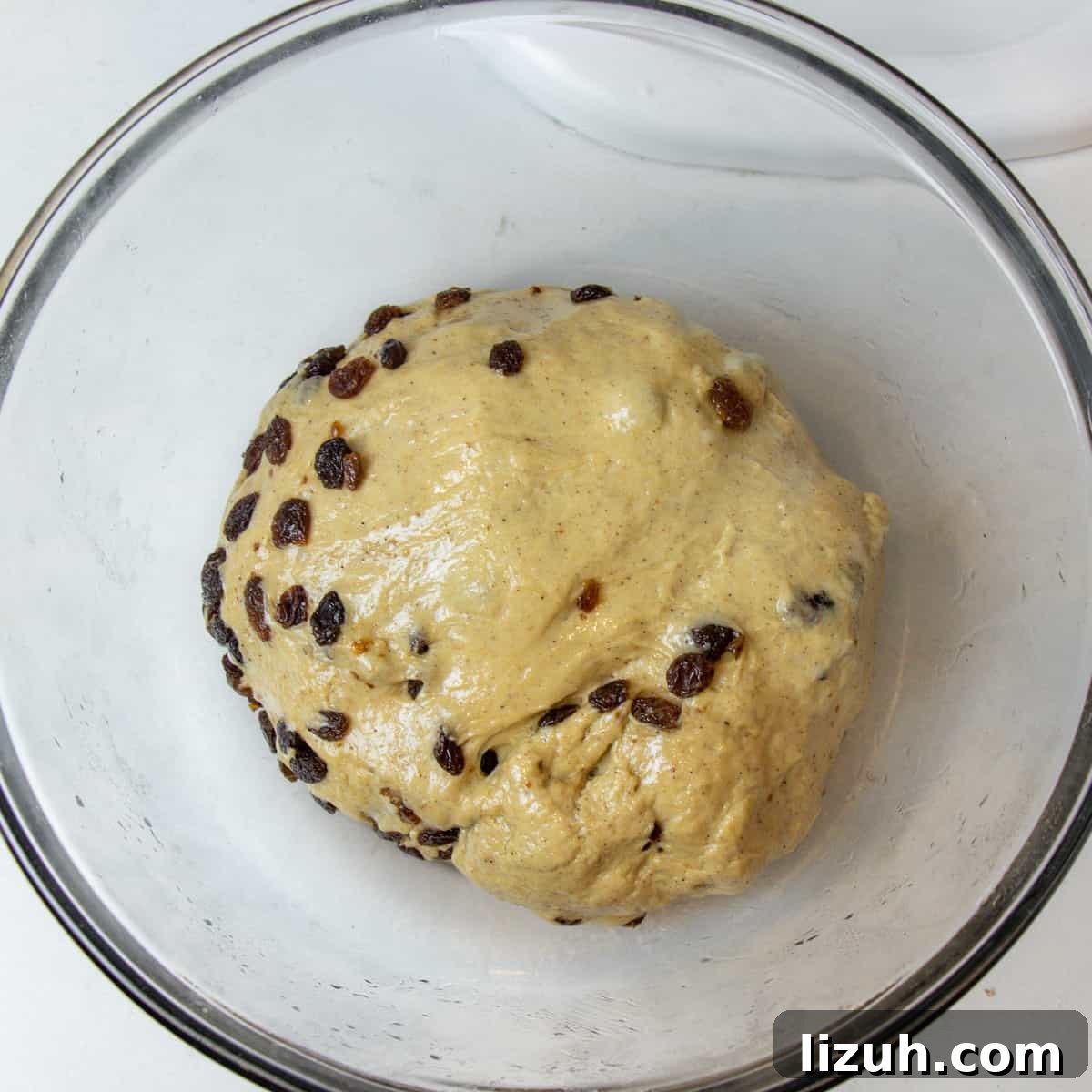Dough in a glass bowl before proofing.