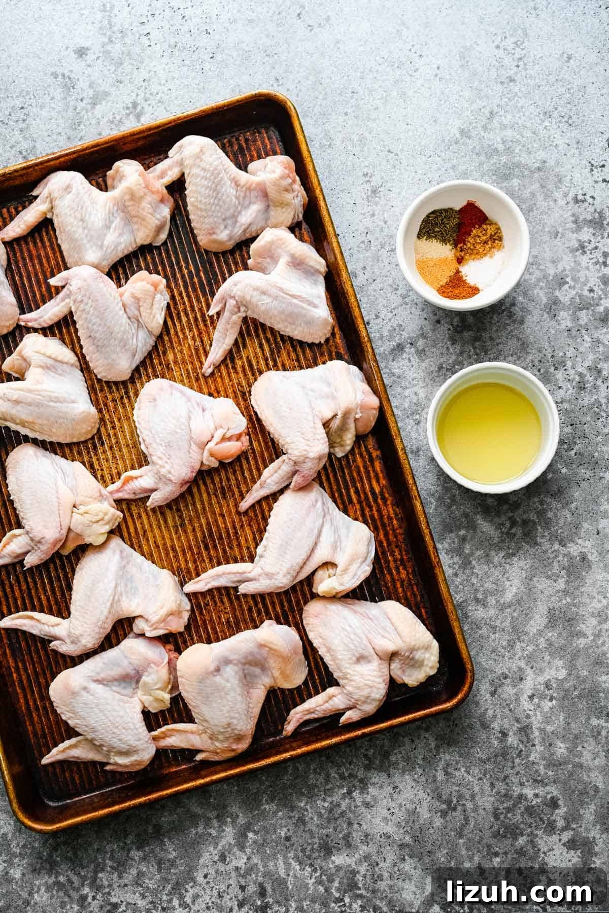Crispy Oven-Baked Chicken Wings with Garlic and Herbs 3 Ingredients needed to make baked whole chicken wings.