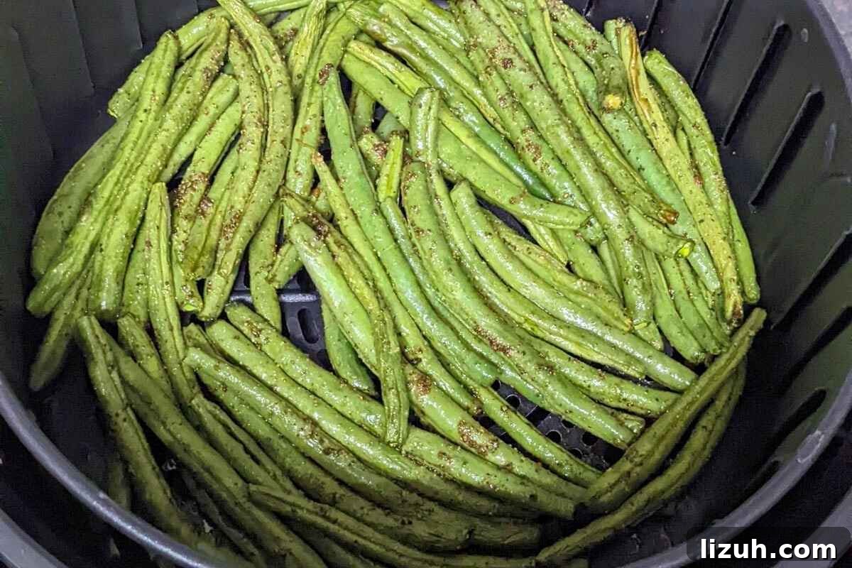 Green beans in air fryer basket