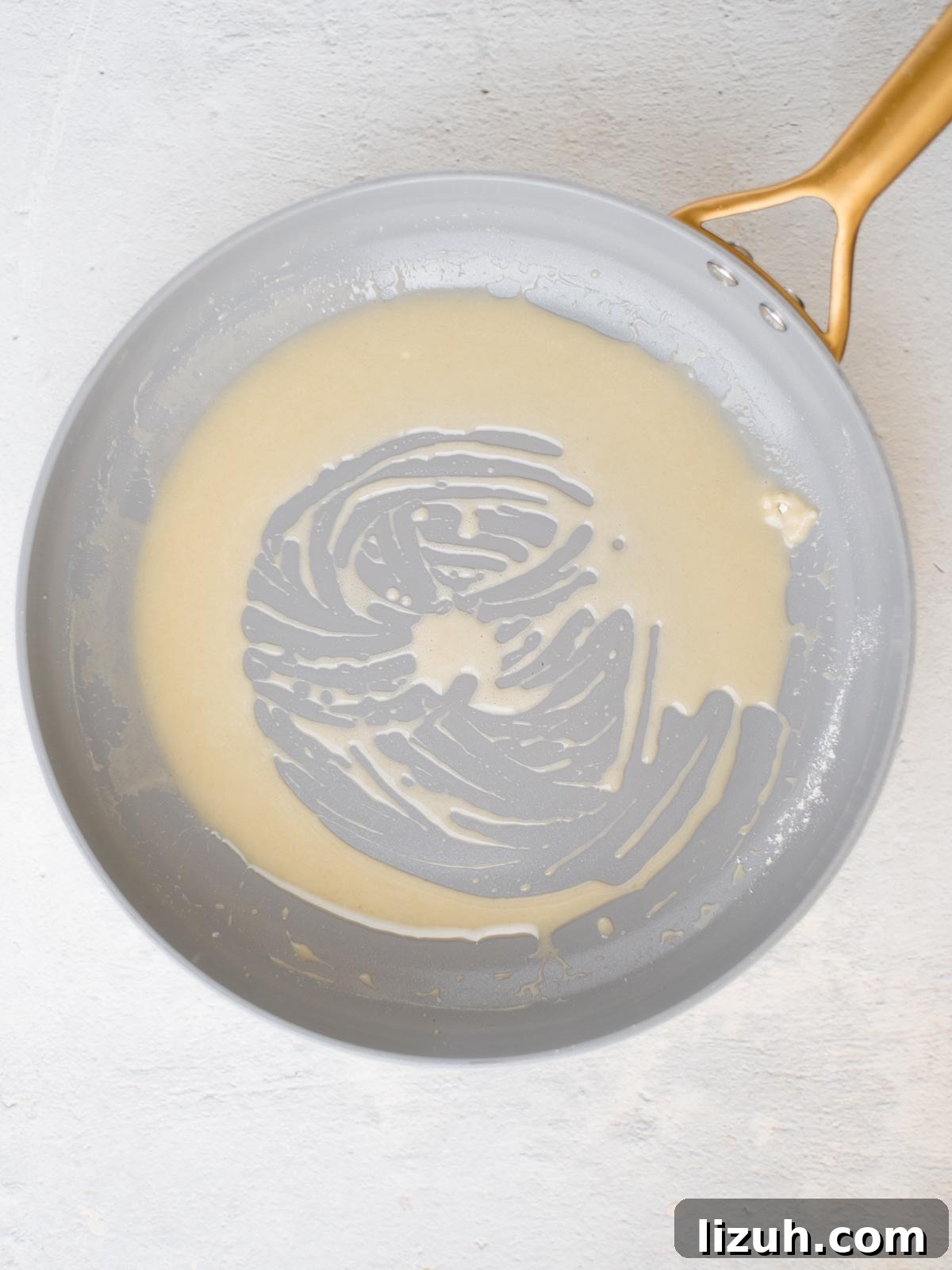 Authentic Homemade Enchilada Sauce Recipe for Rich Flavor 3 a roux in a skillet