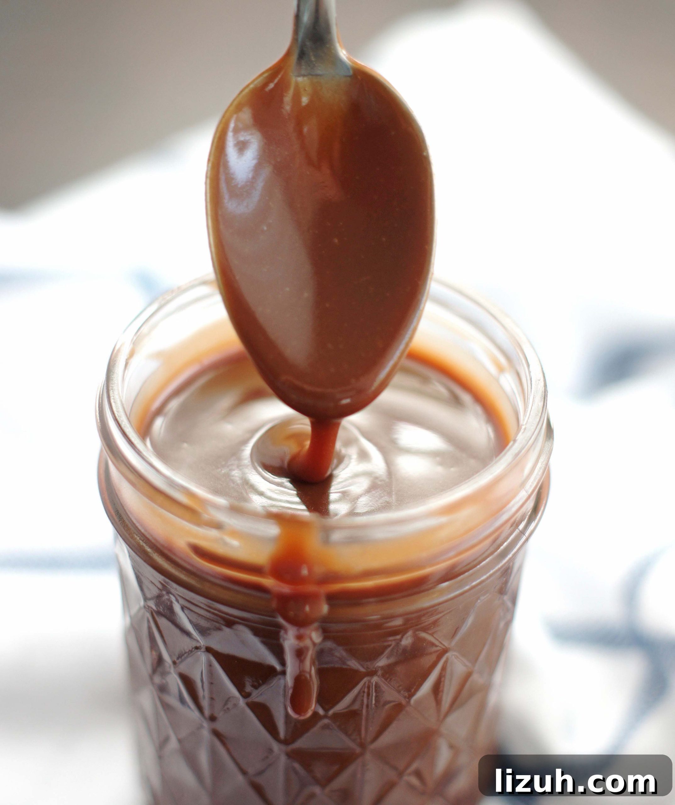 Weeknight Meal Plan: 7 Dinners for the Week (Menu #123) 10 Small jar of homemade chocolate sauce with a spoon dropping with chocolate sauce is hovering above the jar