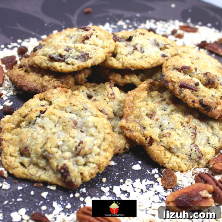 Pecan and Raisin Oatmeal Cookies. Soft and Chewy on the inside and crispy on the outside, these are the BEST EVER oatmeal cookies, loaded with pecan nuts and raisins. A simple classic cookie recipe