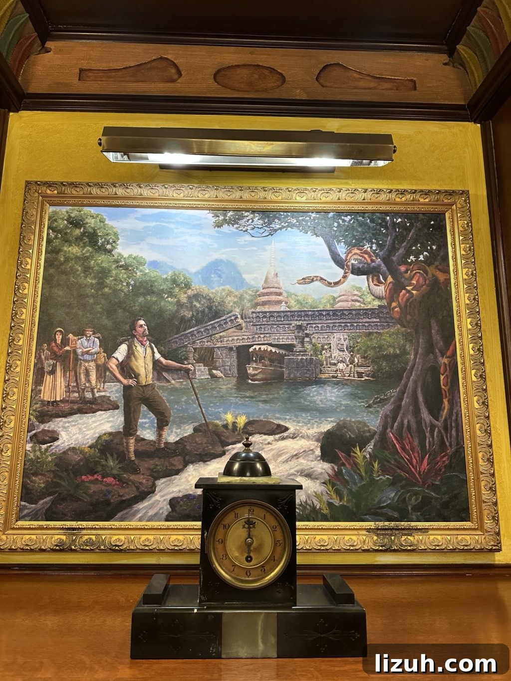 A portrait from inside Skipper Canteen of an adventurer looking at a boat emerging from under a bridge