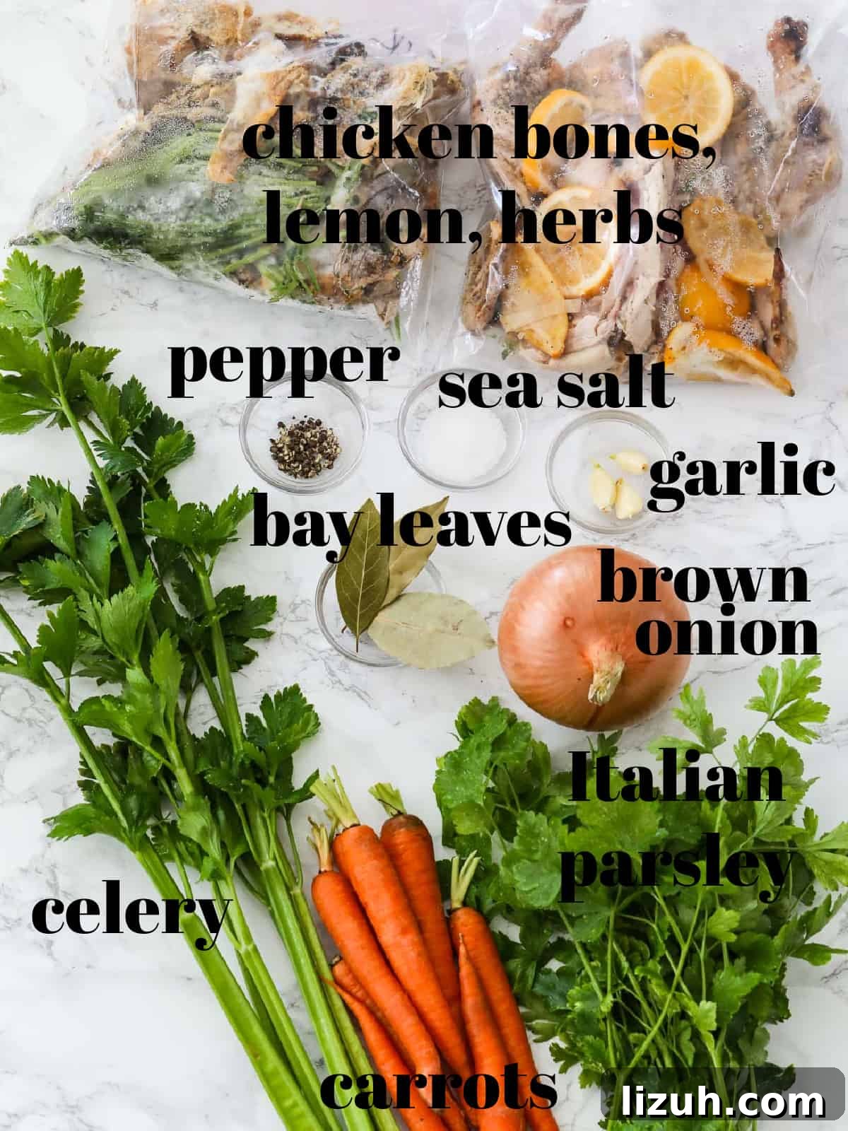 Homemade Chicken Bone Broth Recipe: Rich, Slow-Simmered Stock 4 A table filled with ingredients to make a chicken stock recipe all labeled.