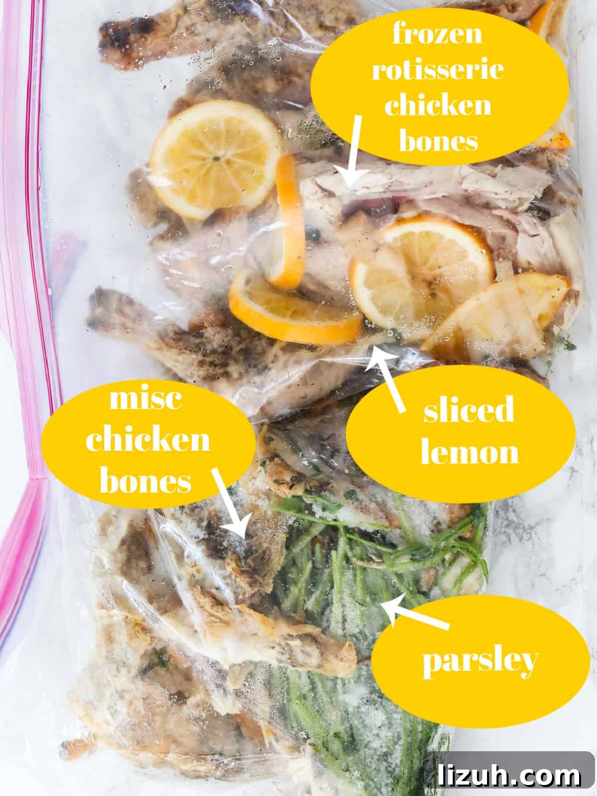 Homemade Chicken Bone Broth Recipe: Rich, Slow-Simmered Stock 5 Large freezer bags filled with frozen chicken bones, lemons, and parsley to make chicken stock.