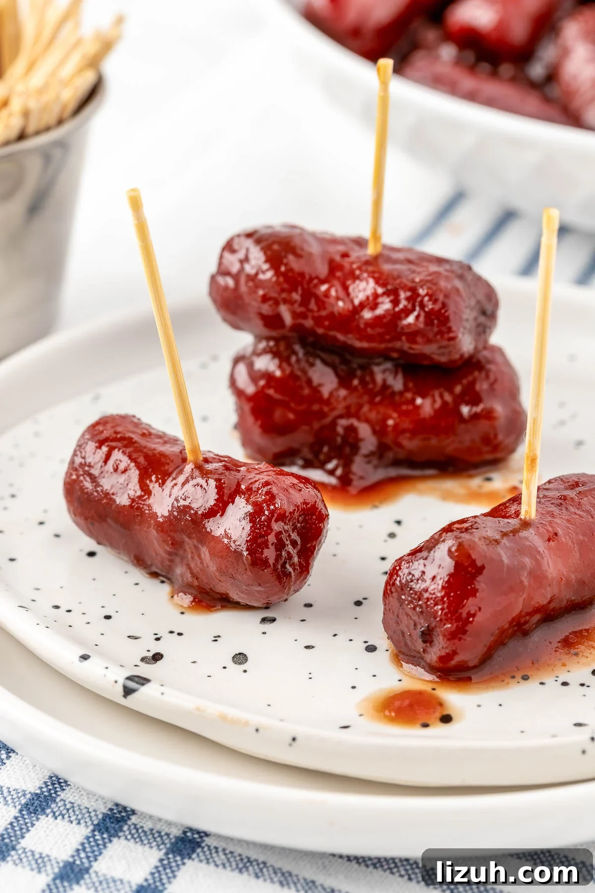 Slow Cooker Little Smokies Recipe: Sweet & Tangy Party Sausages 7 Crowd-pleasing appetizer for game days and family gatherings.