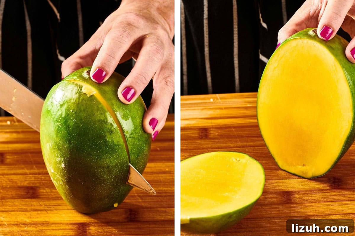 How to Cut a Mango Like a Pro: Quick Step-by-Step Guide 8 Woman cutting large piece off unpeeled mango.