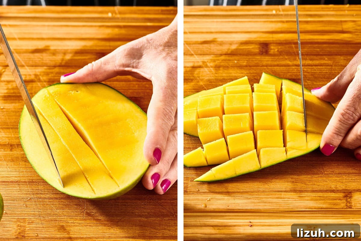 How to Cut a Mango Like a Pro: Quick Step-by-Step Guide 9 Woman scoring flesh of fresh, unpeeled mango with knife.
