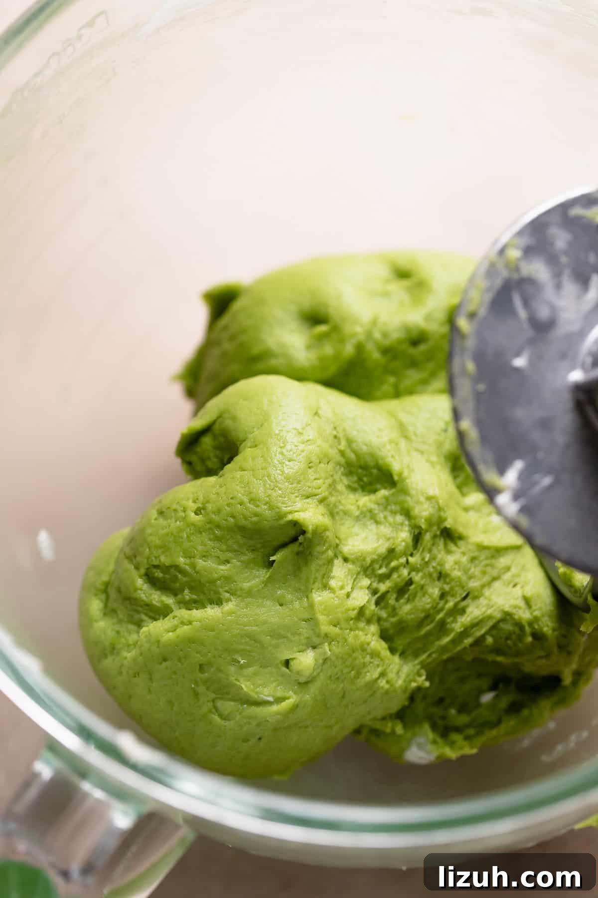 Soft matcha dough in a mixing bowl.