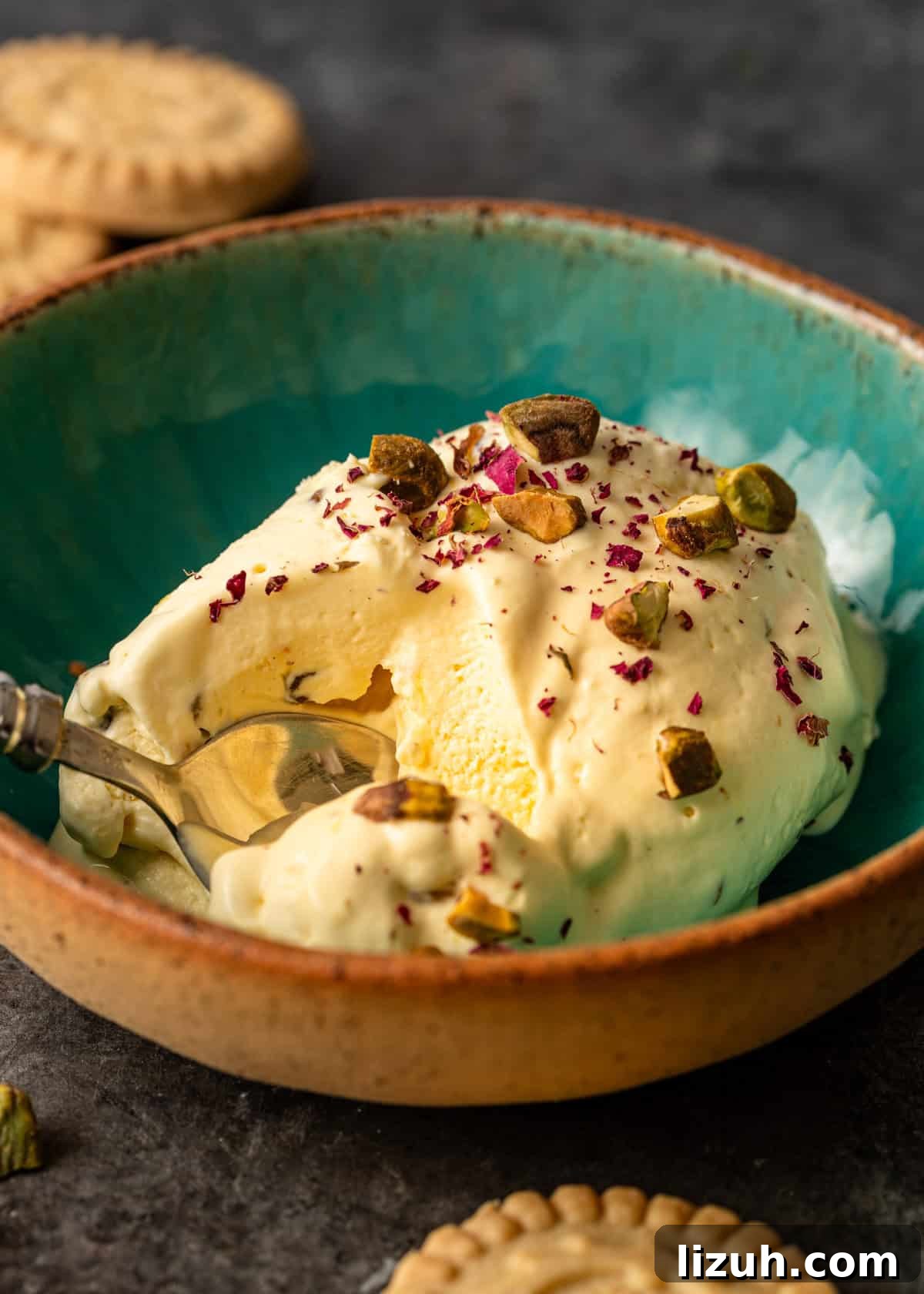 closeup: a serving of my persian ice cream recipe in a bowl with a spoon