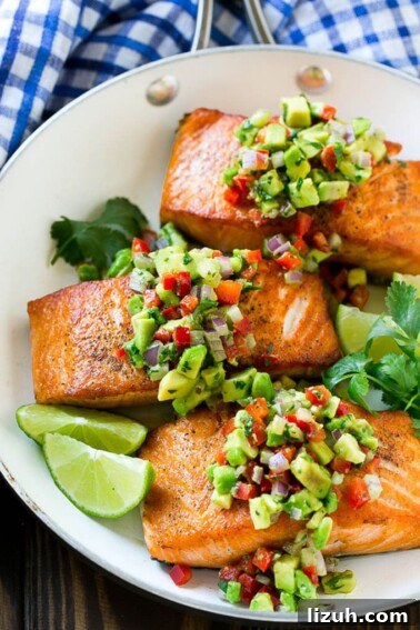Authentic Chipotle Salsa Recipe for Smoky, Flavorful Dips 11 Salmon with avocado salsa in a frying pan.