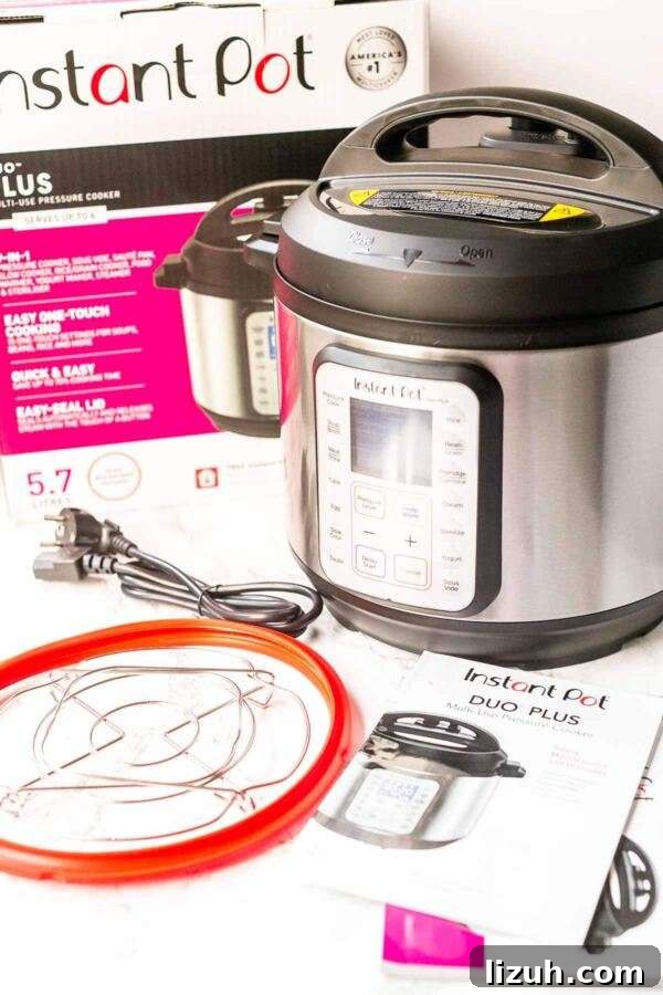 Instant Pot Duo Plus and included accessories out of the box.