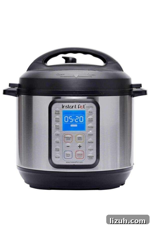 Pressure cooking in the Instant Pot with the display showing status.