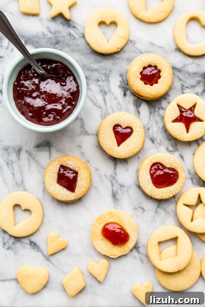 How to Tell When Jam Is Set: Simple Ways to Find the Perfect Jam Set 14 shortbread cutout cookies sandwiched with strawberry jam filling