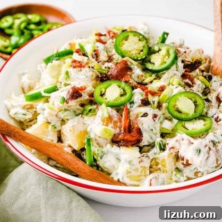 Jalapeno Popper Potato Salad in Bowl with Wooden Spoon