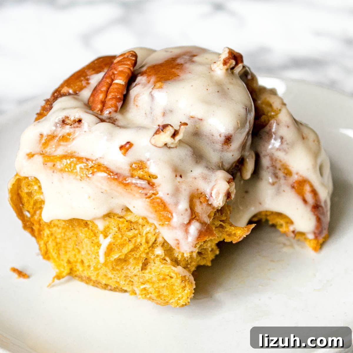 Pumpkin Spice Cinnamon Rolls with Maple Glaze 2 easy pumpkin spice cinnamon rolls