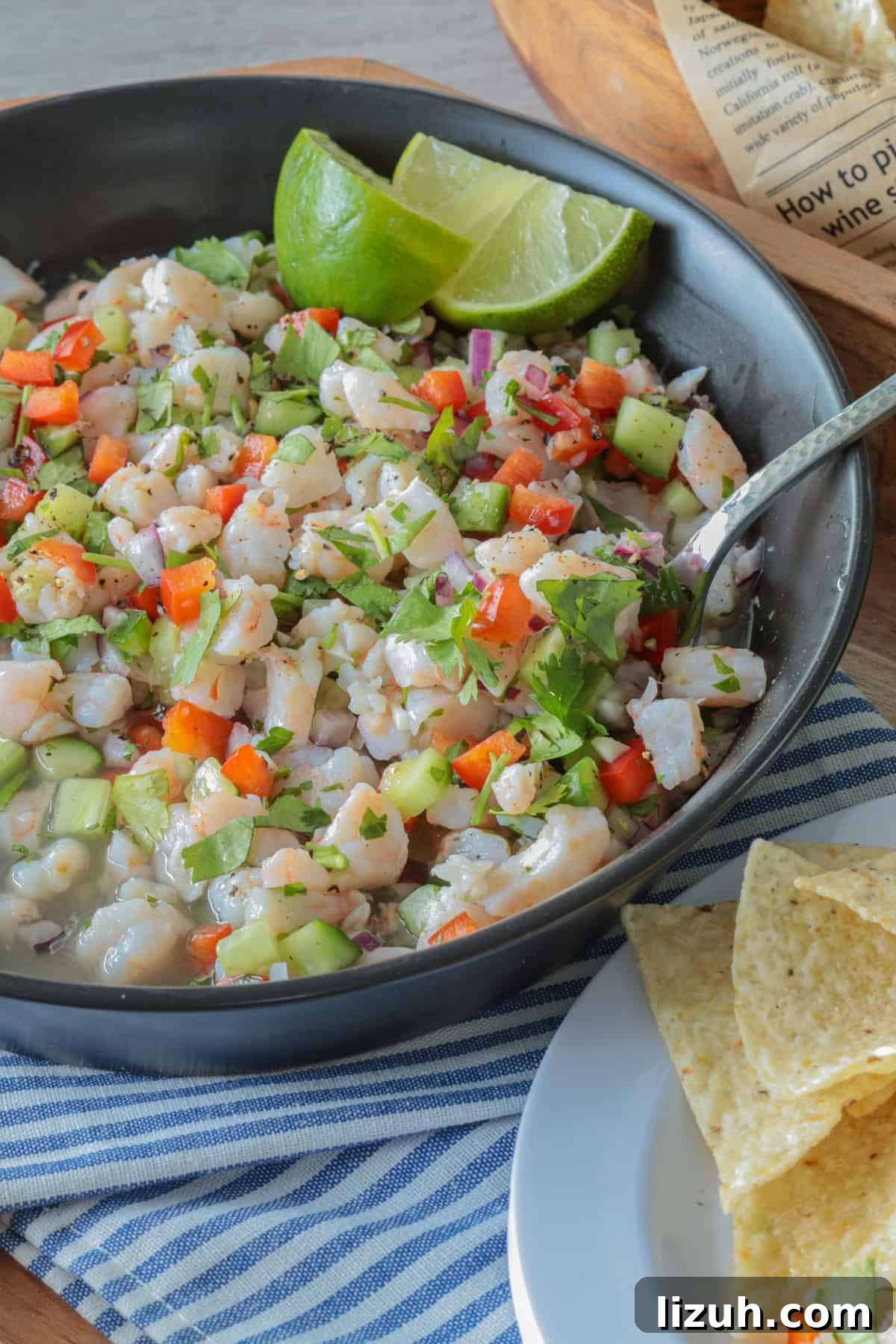 Shrimp ceviche in a bowl with a spoon.