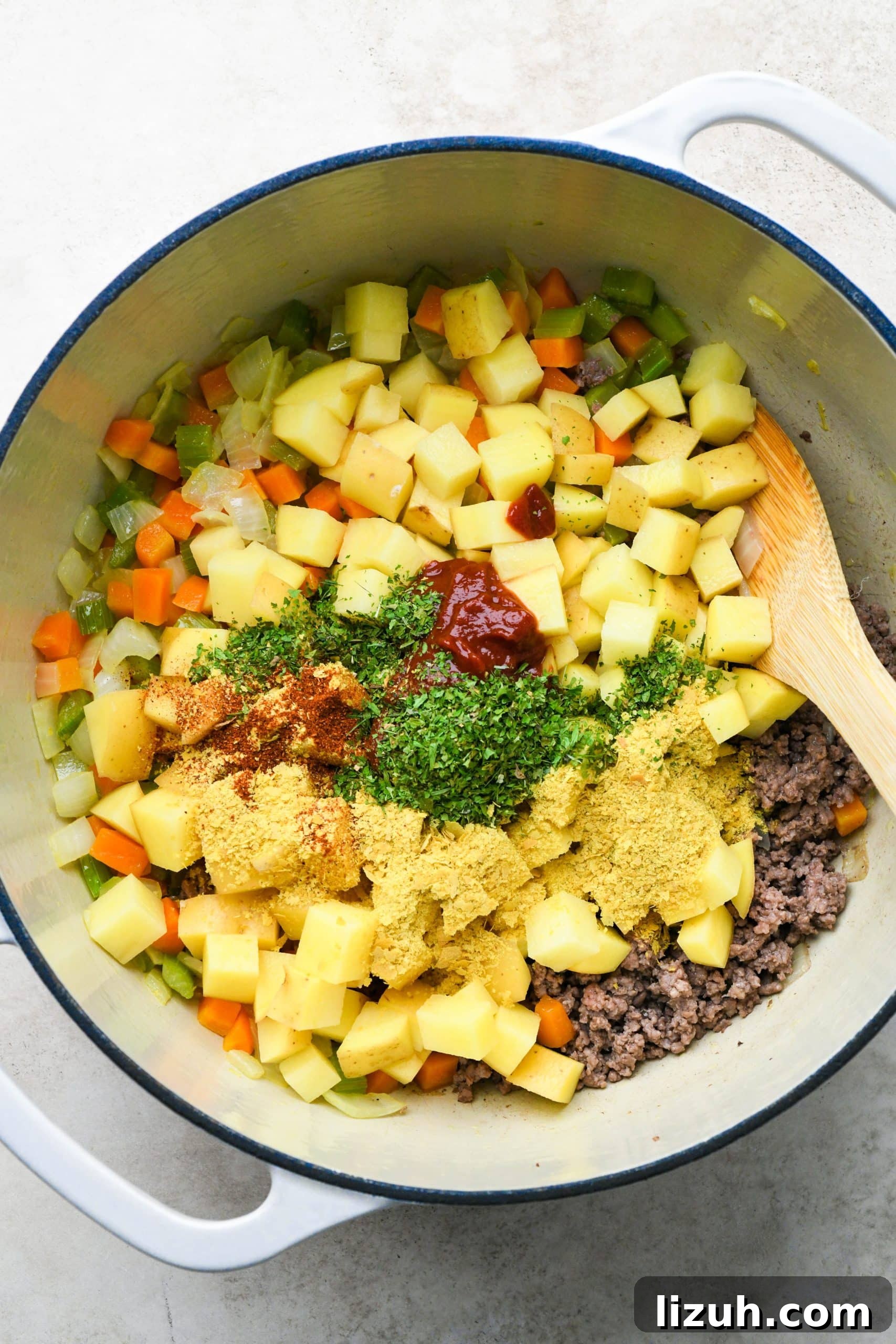 Dairy-Free Cashew Cream Shepherd’s Pie Soup Recipe 9 How to make shepherds pie soup: Potatoes, tomato paste, and spices add to the soup pot with the other ingredients.