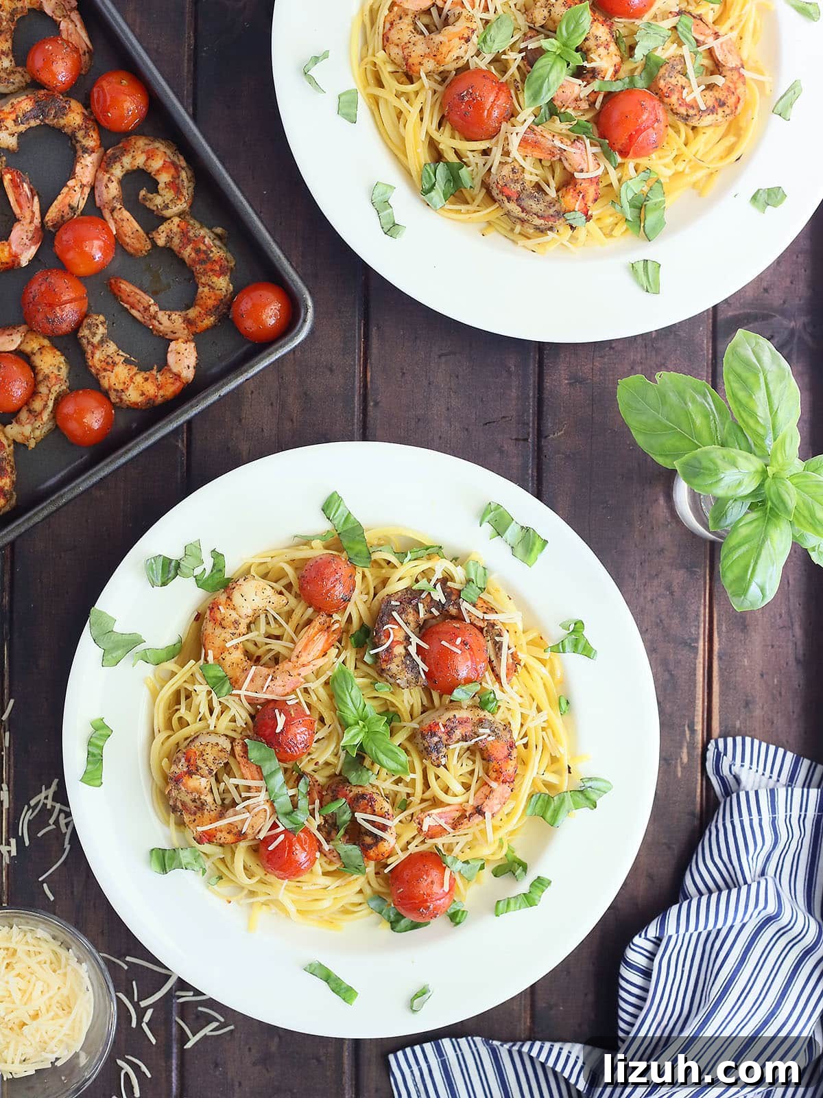 Back-to-School Dinner Ideas: Quick Family-Friendly Recipes 22 two plates of royal red shrimp and cherry tomatoes garnished with fresh basil and parmesan cheese