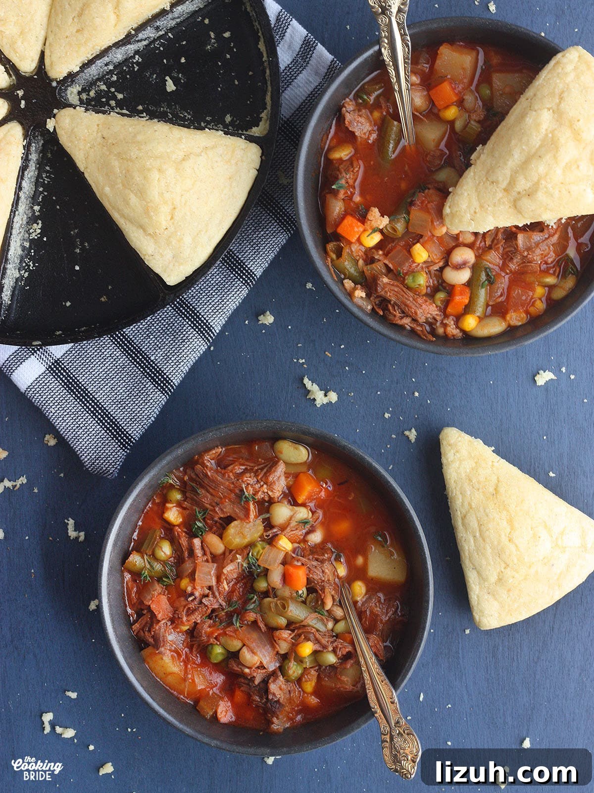 Back-to-School Dinner Ideas: Quick Family-Friendly Recipes 37 overhead shot of two bowls of vegetable beef soup with two wedges of cornbread and a pan of cornbread to the side