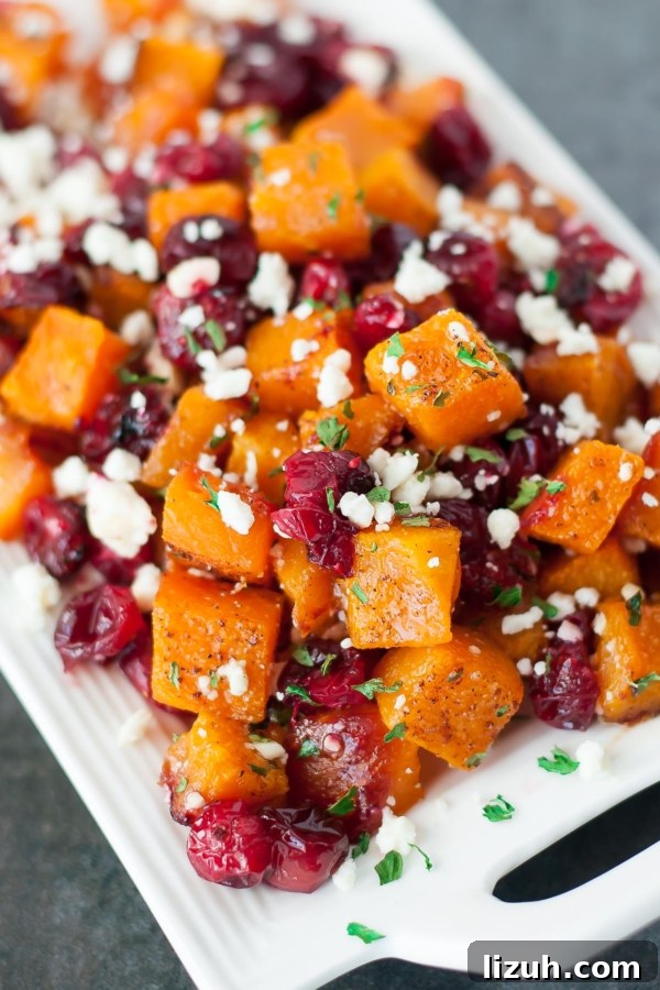Savory Vegetarian Thanksgiving Menu Ideas for a Memorable Feast 10 Honey Roasted Butternut Squash with Cranberries and Feta - This sweet and savory side dish is perfect for the holidays and loaded with Fall flavor!