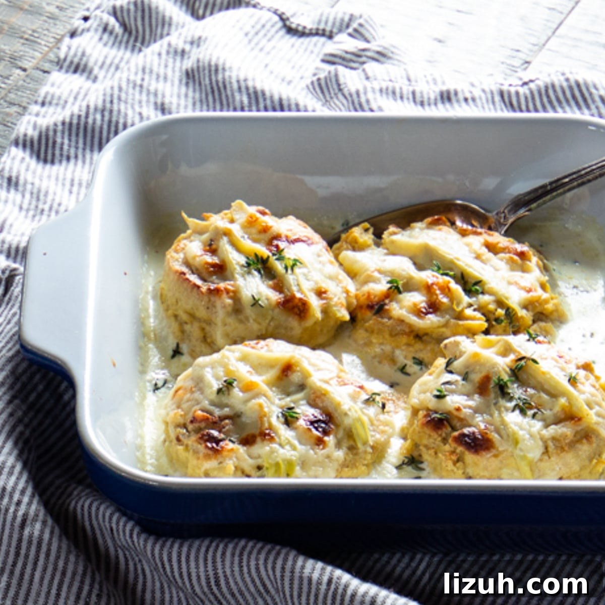 April Vegetarian Meal Plan: Week 4 Recipes & Grocery List 8 A baking dish of double baked cheese soufflés with artichokes.
