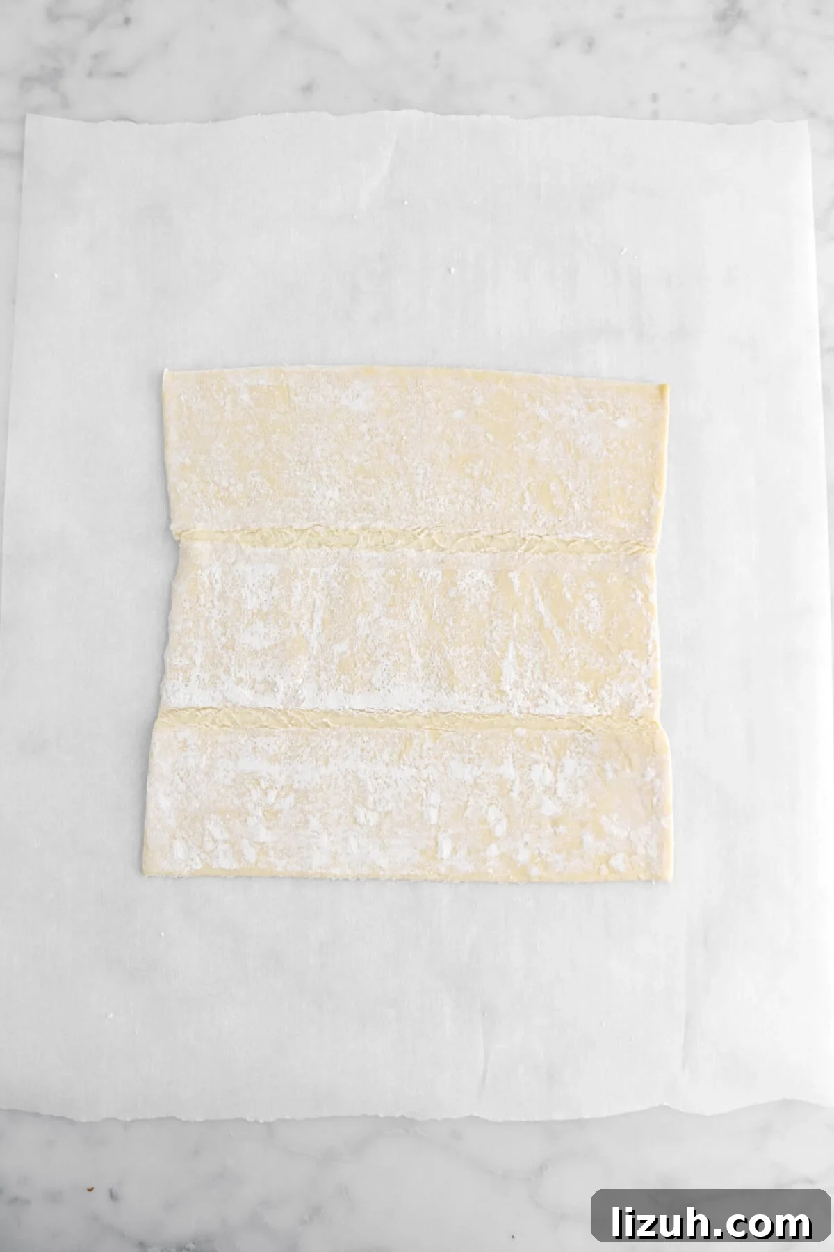 puff pastry sheet on parchment paper.