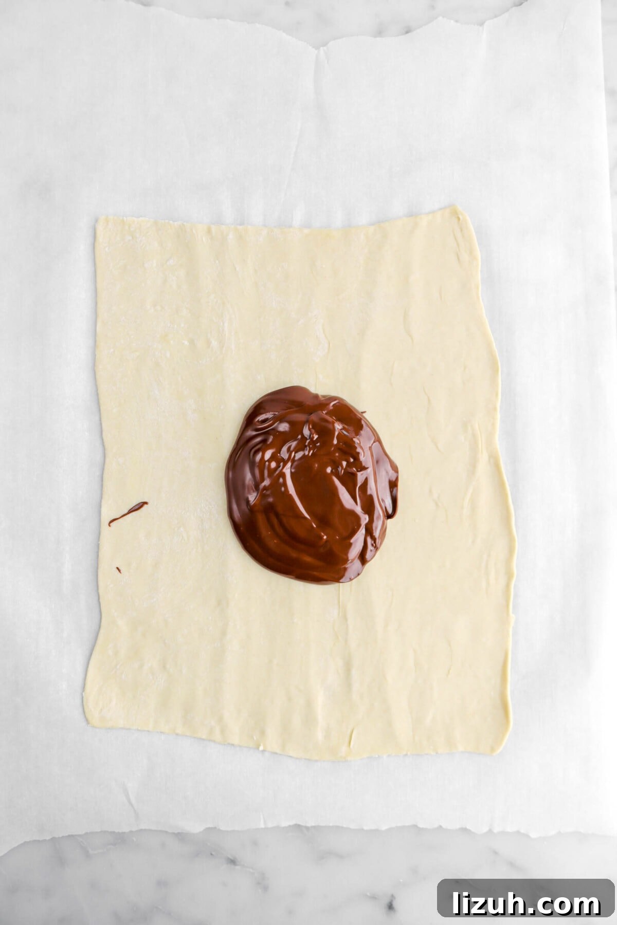 ganache piled in the middle of puff pastry.