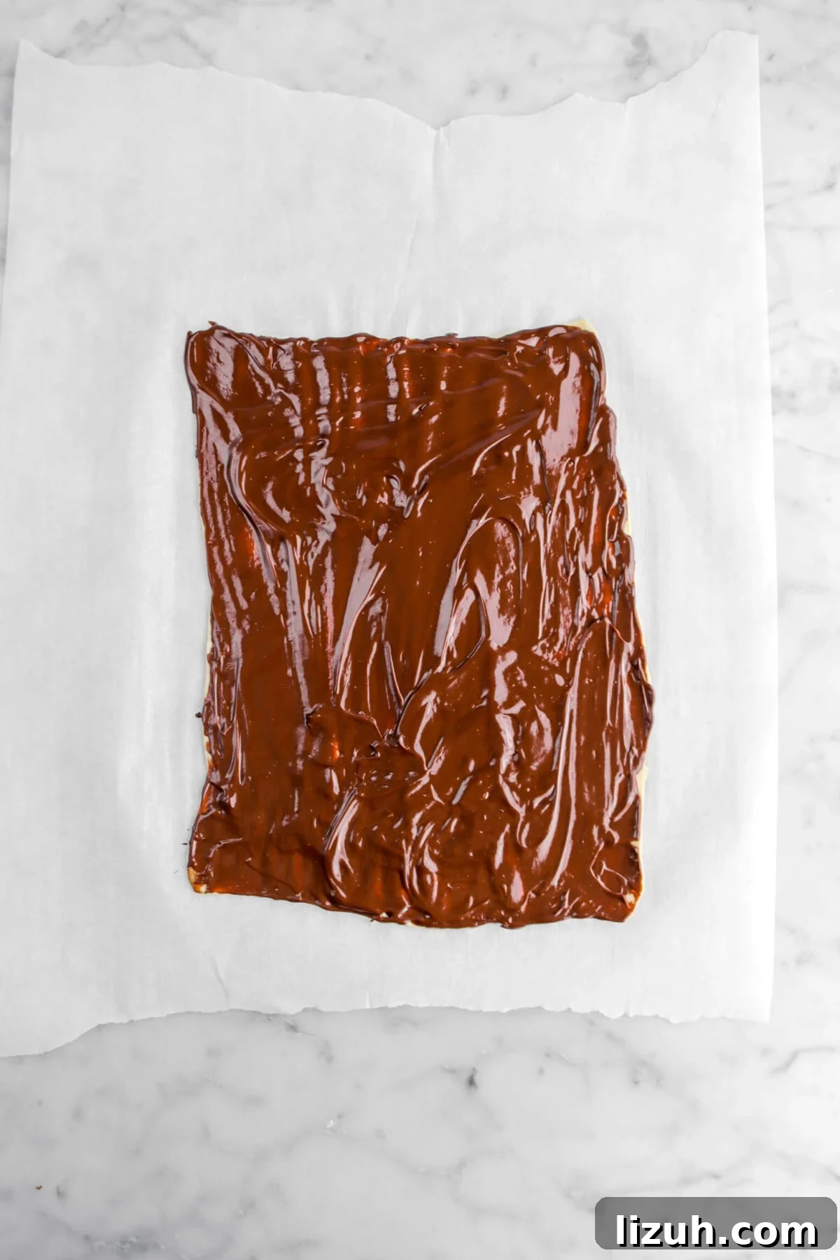 ganache spread across puff pastry.