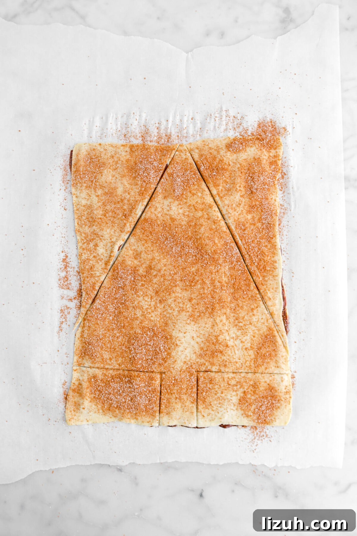 christmas tree shape cut into puff pastry.