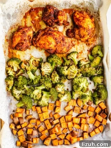 Chicken, broccoli, and sweet potatoes on a sheet pan.