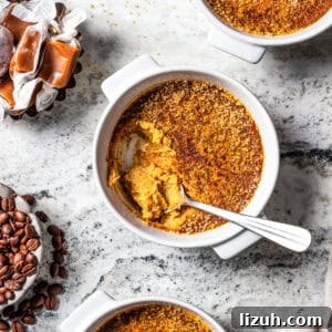 Three ramekins with creme brulee.