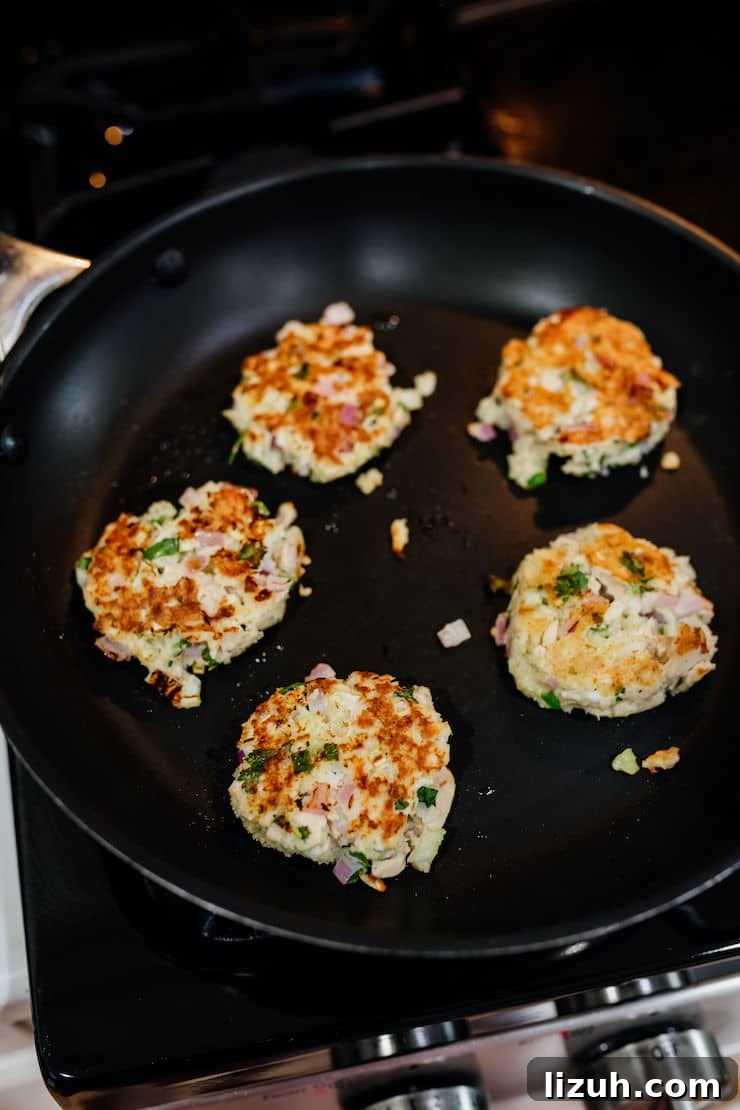 Crispy Tuna Patties with Lemon-Dill Sauce 6 tuna patties lightly pan fried in a non-stick skillet