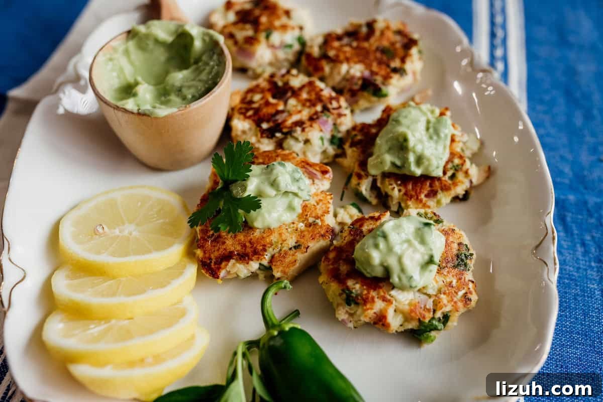 Crispy Tuna Patties with Lemon-Dill Sauce 9 tuna patties on a serving tray ready to serve as appetizers