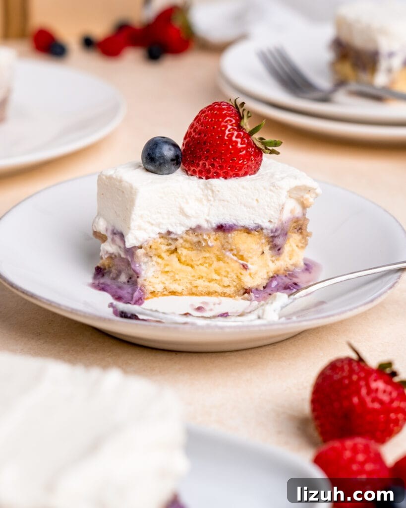 A slice of cake with a bite taken out of it.