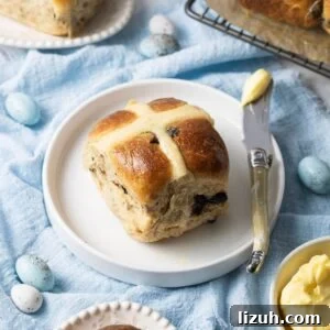 13 Must-Try Thermomix Sourdough Recipes You Can Make Today 12 Sourdough hot cross bun on plate