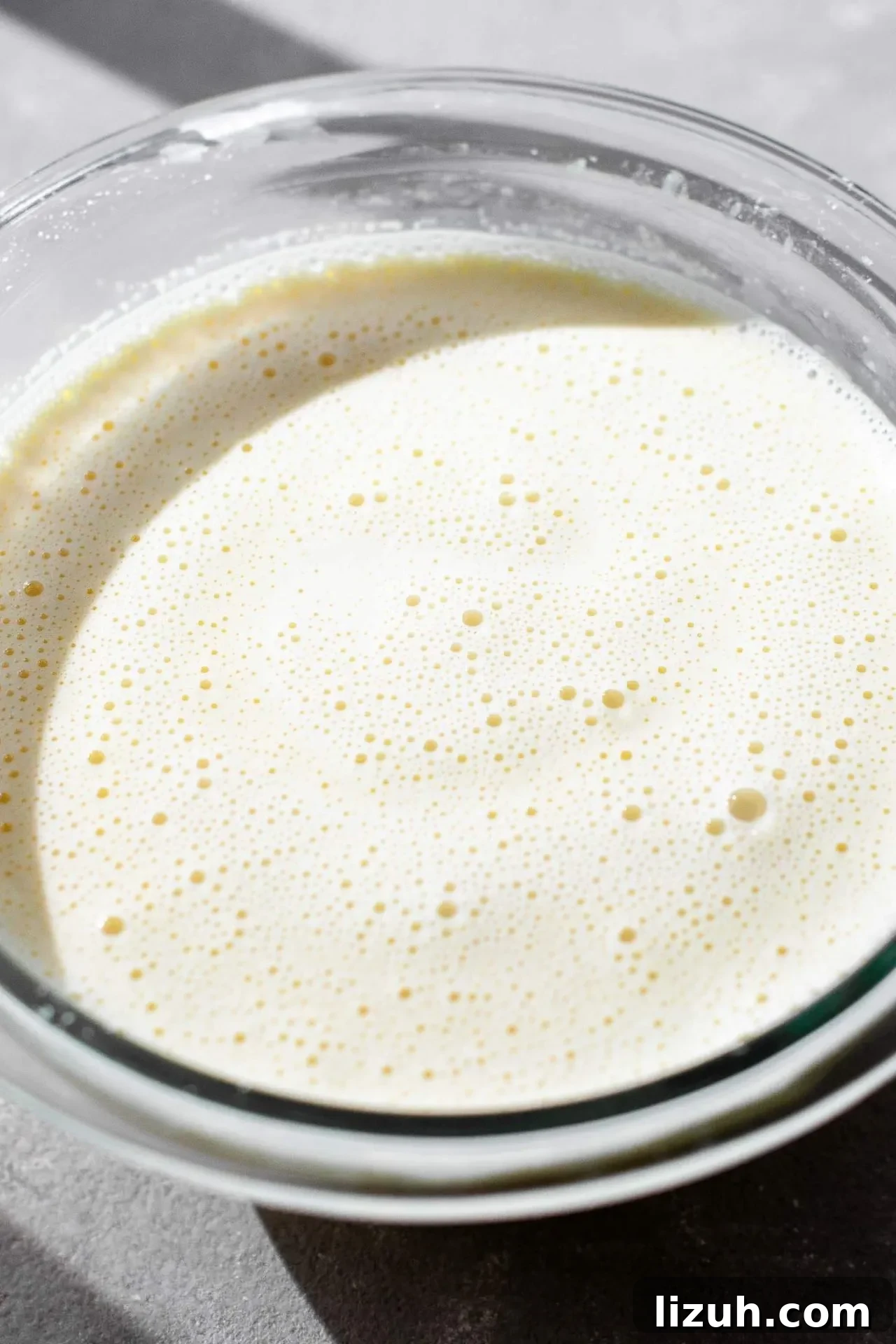 pastry cream tempered egg mixture in bowl