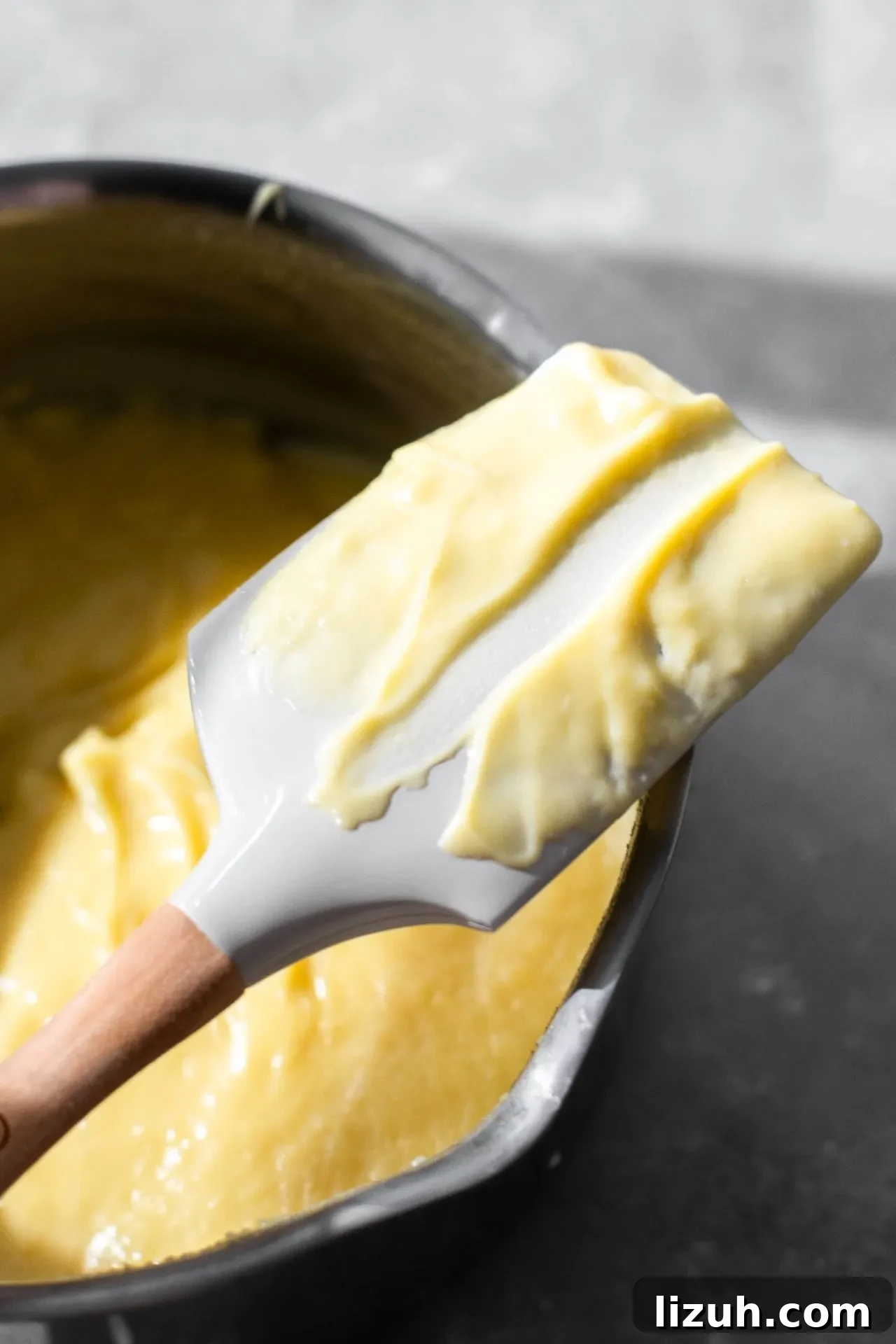 pastry cream coating the back of a spatula