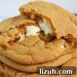 Butterscotch Cookies Stuffed with White Chocolate Center 7 White Chocolate Stuffed Butterscotch Cookies. Chewy butterscotch pudding cookies packed full of white chocolate for a melty, gooey middle. These use a butterscotch pudding mix to give the strong butterscotch flavour and to add chew to the cookie.