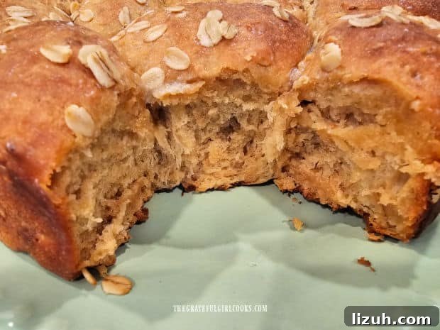Oatmeal Molasses Dinner Rolls - The Grateful Girl Cooks! A peek inside the dinner rolls after a roll or two have been removed.