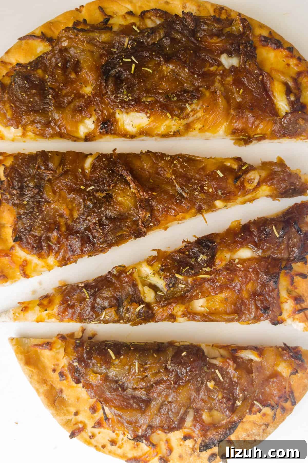 Naan Pizza with Caramelized Onions — Air Fryer or Oven Recipe 2 naan pizza with caramelized onions cut and finished