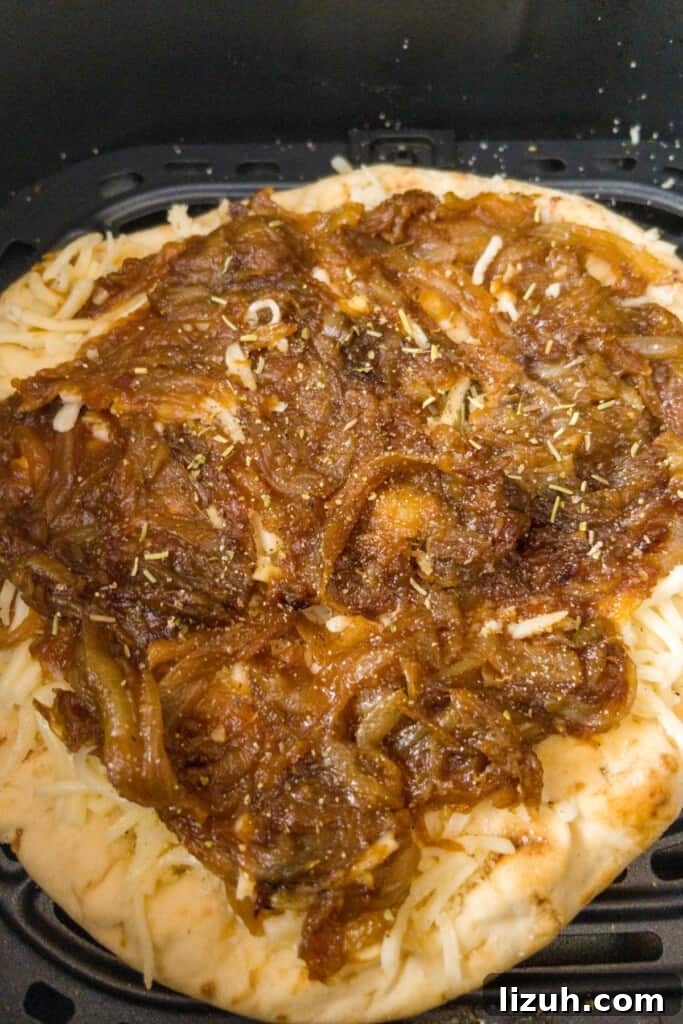 Naan Pizza with Caramelized Onions — Air Fryer or Oven Recipe 5 naan pizza preparation step 2 add caramelized onions
