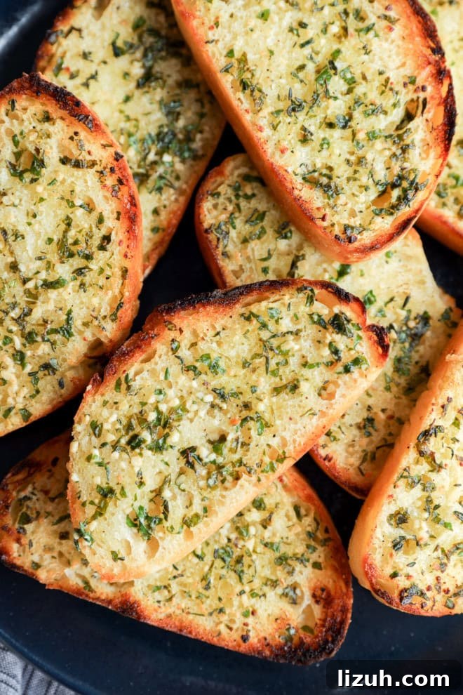 easy fresh herb bread slices on a plate with butter