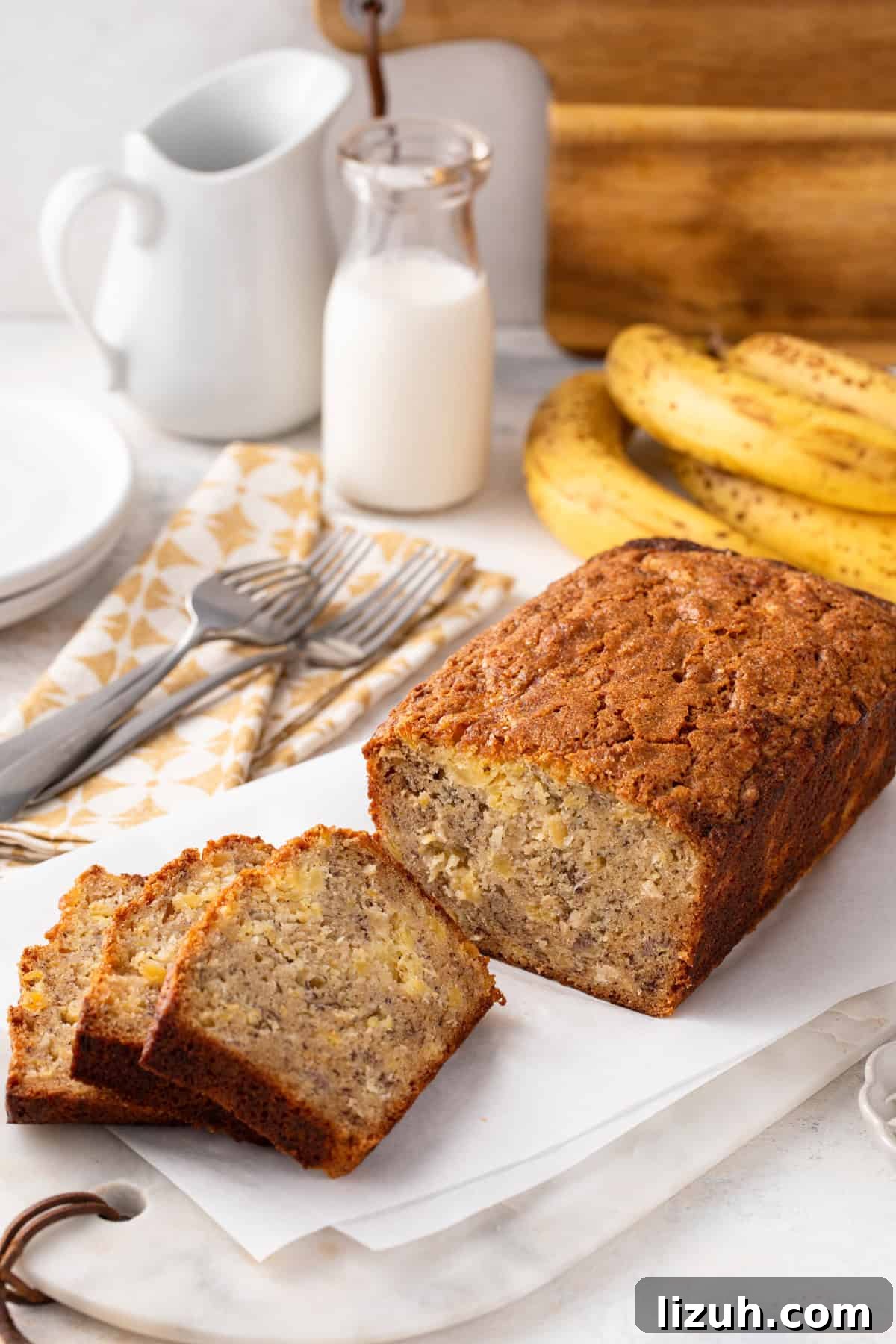 Sliced loaf of pineapple banana bread.