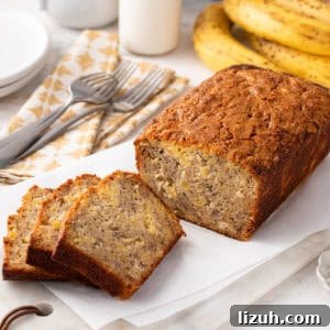 Sliced loaf of pineapple banana bread.